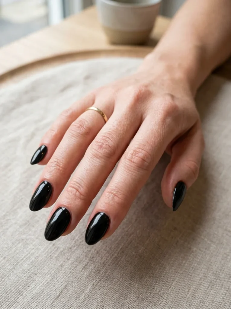 Glossy Black Almond Nails