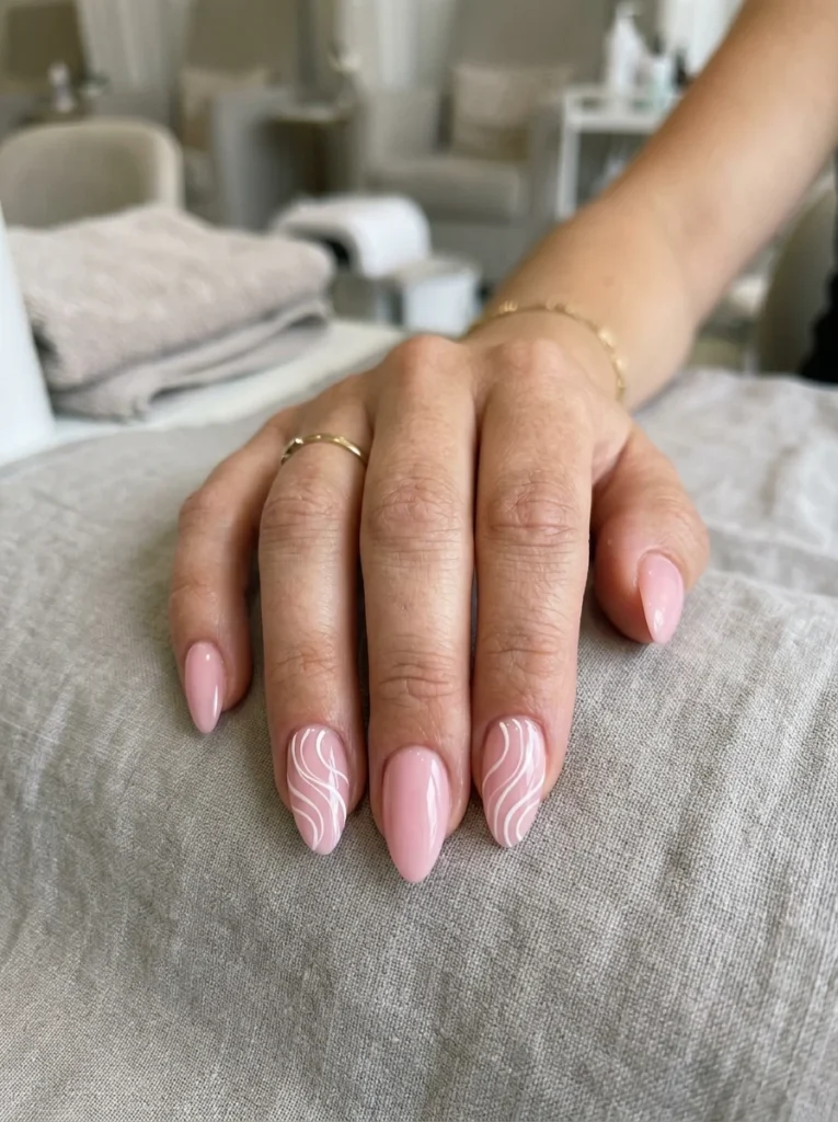 Pink and White Swirl Almond Nails